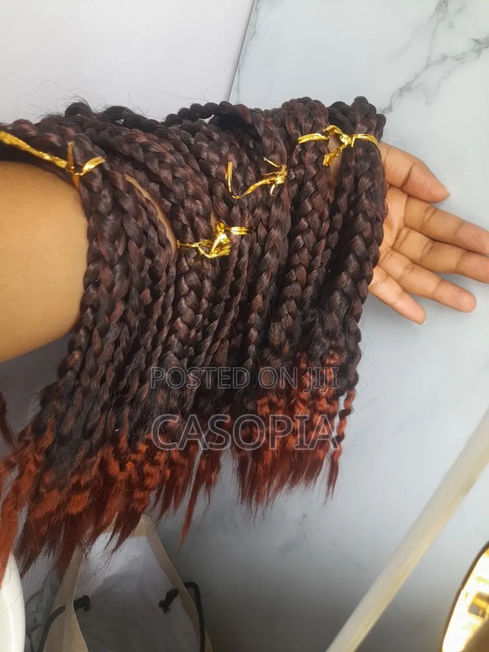 Pre-Made Synthetic Box Braid Extensions Featuring an Ombré Color
