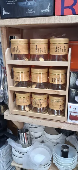 9-Piece Glass Storage Jar Set With a 3-Tier Bamboo Rack.