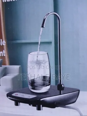 የውሃ ማውጫ ማሽን (Automatic Water Dispenser)