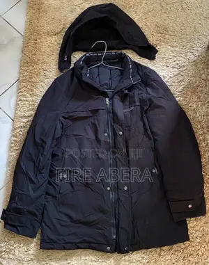 Men's Mid-Length Winter Parka Jacket With a Detachable Hood.