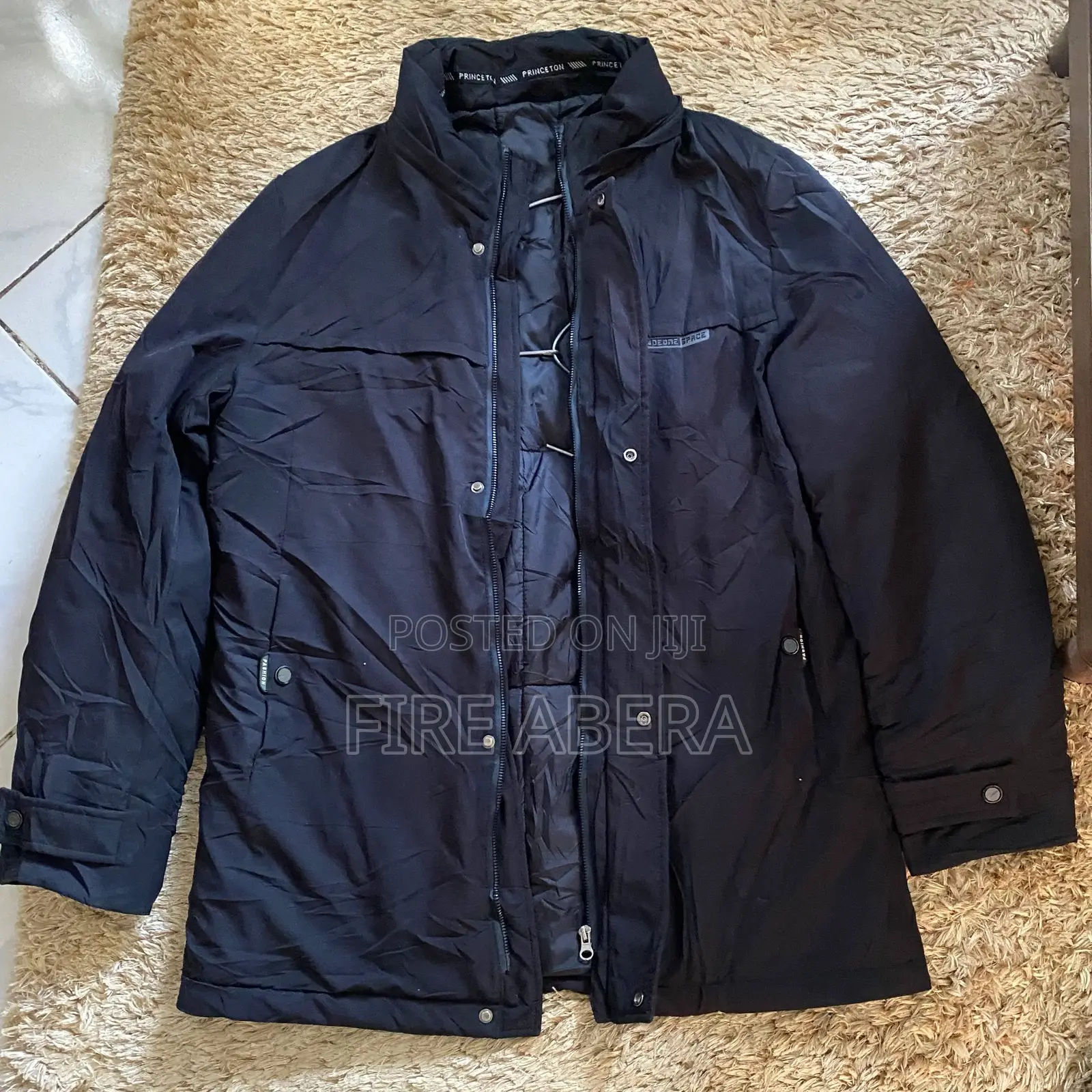 Men's Mid-Length Winter Parka Jacket With a Detachable Hood.