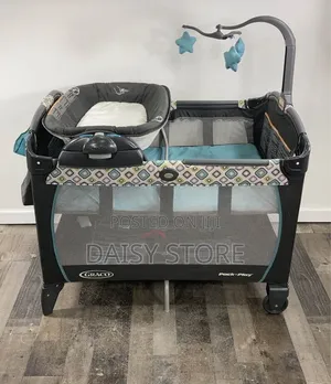የሕፃናት መልቲ-ፋንክሽን አልጋ (Graco Pack 'N Play With Portable Bassinet)