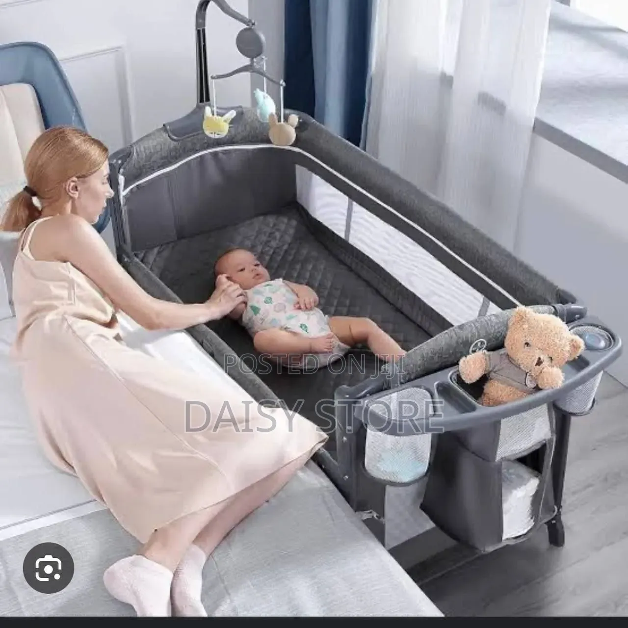የሕፃናት መልቲ-ፋንክሽን አልጋ (Graco Pack 'N Play With Portable Bassinet)