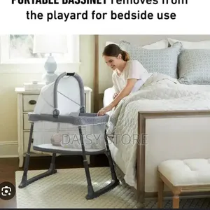 የሕፃናት መልቲ-ፋንክሽን አልጋ (Graco Pack 'N Play With Portable Bassinet)