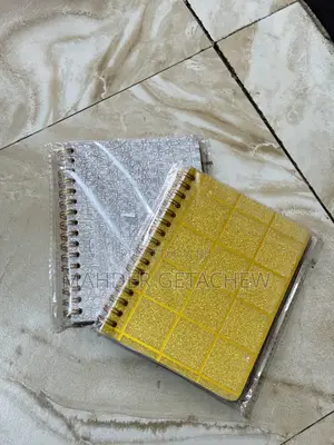 Small Spiral-Bound Notebook.