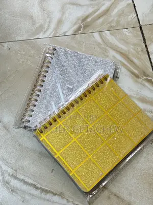 Small Spiral-Bound Notebook.