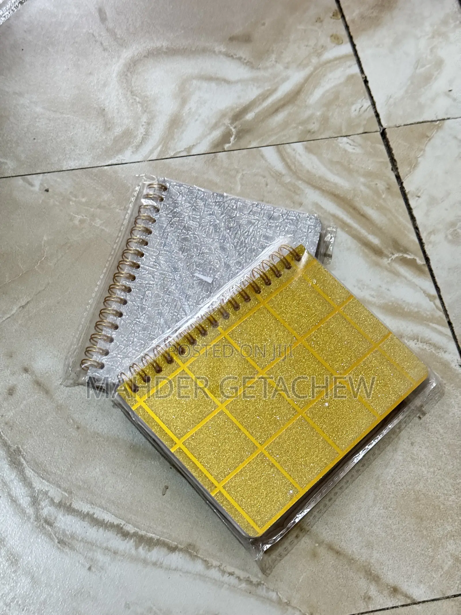 Small Spiral-Bound Notebook.