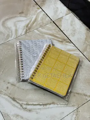 Small Spiral-Bound Notebook.