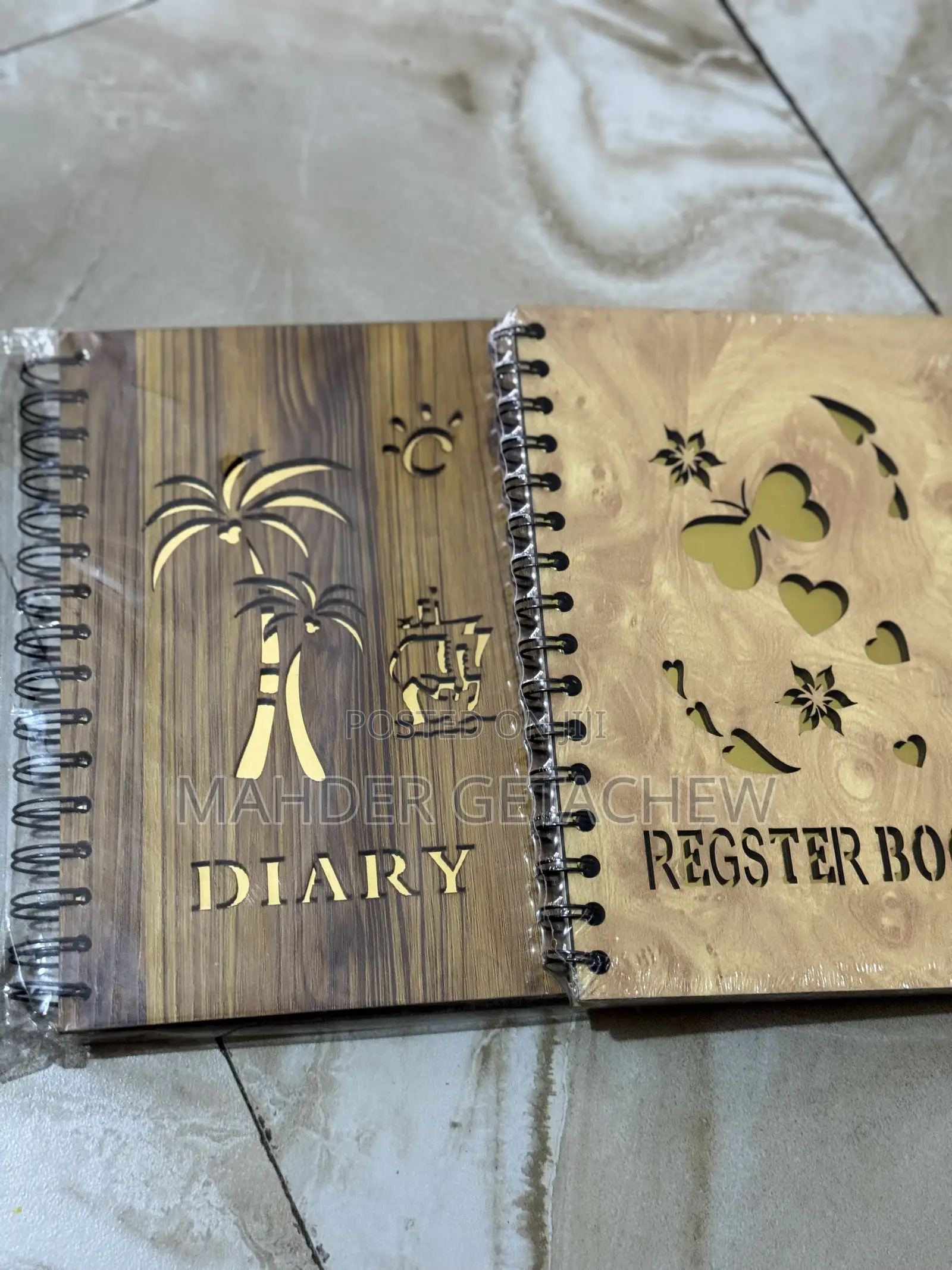 Spiral-Bound Register Book.