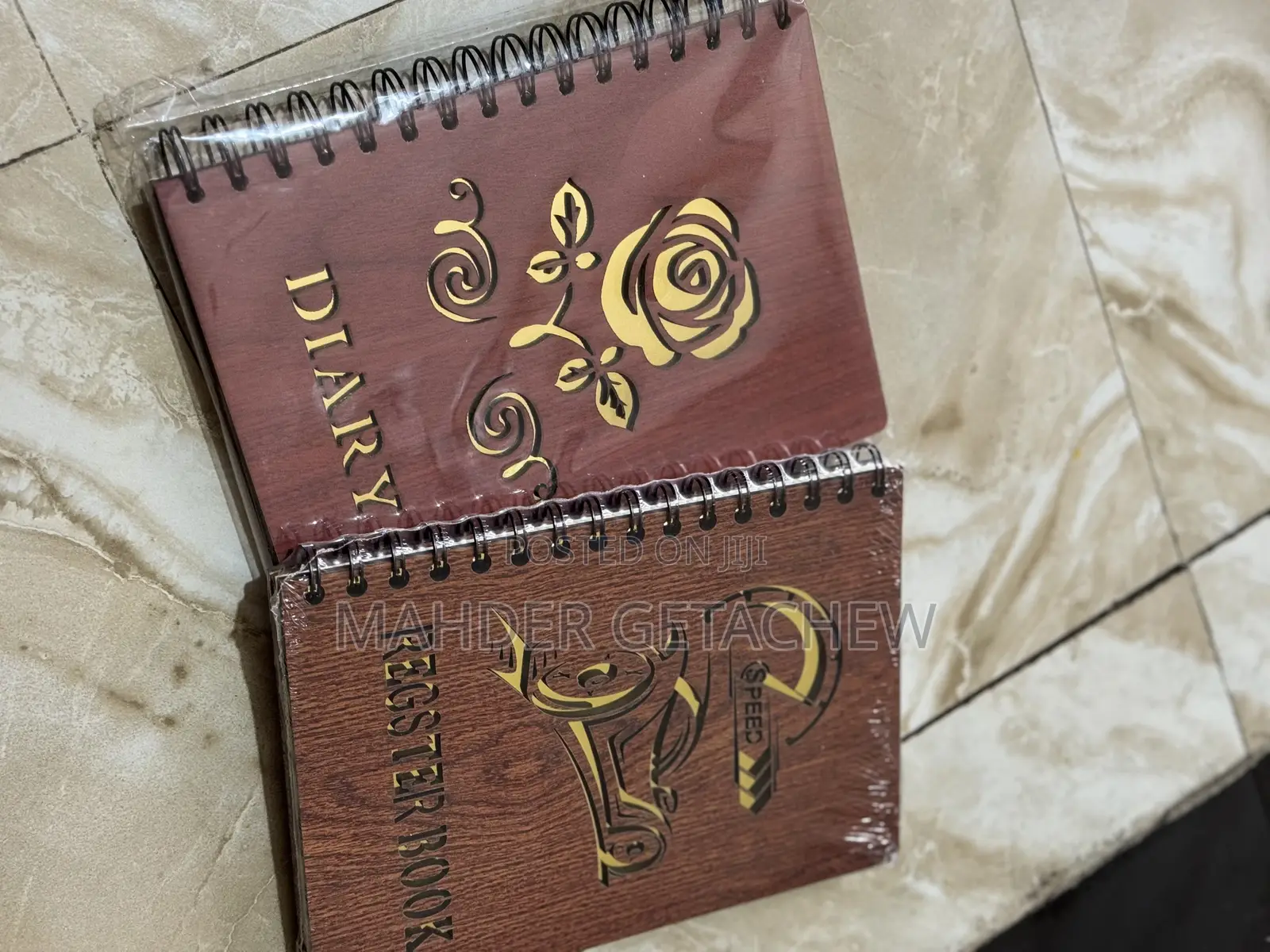 Spiral-Bound Register Book.
