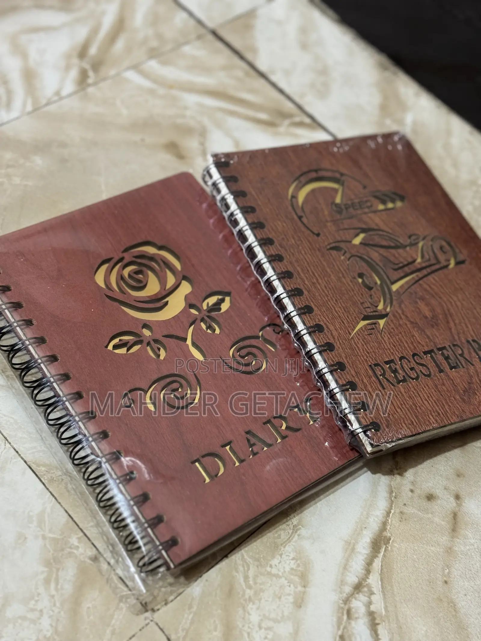 Spiral-Bound Register Book.