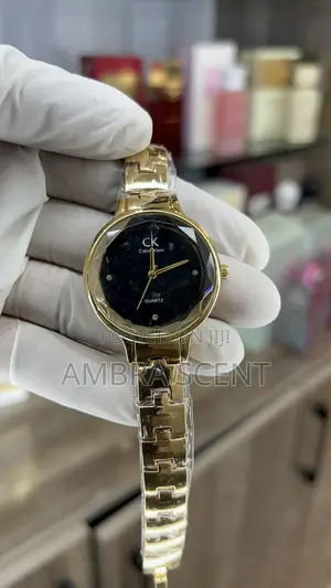 Calvin Klein Gold Women's Quartz Watch - Faceted Glass Black Dial