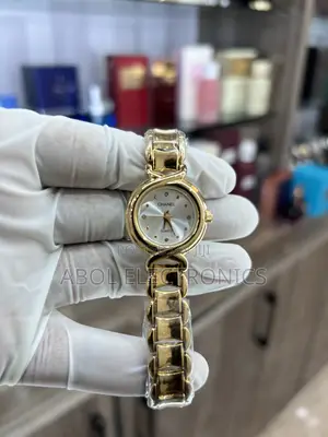 Chanel Gold Women's Quartz Watch - Silver Sunburst Dial Cross-Cross