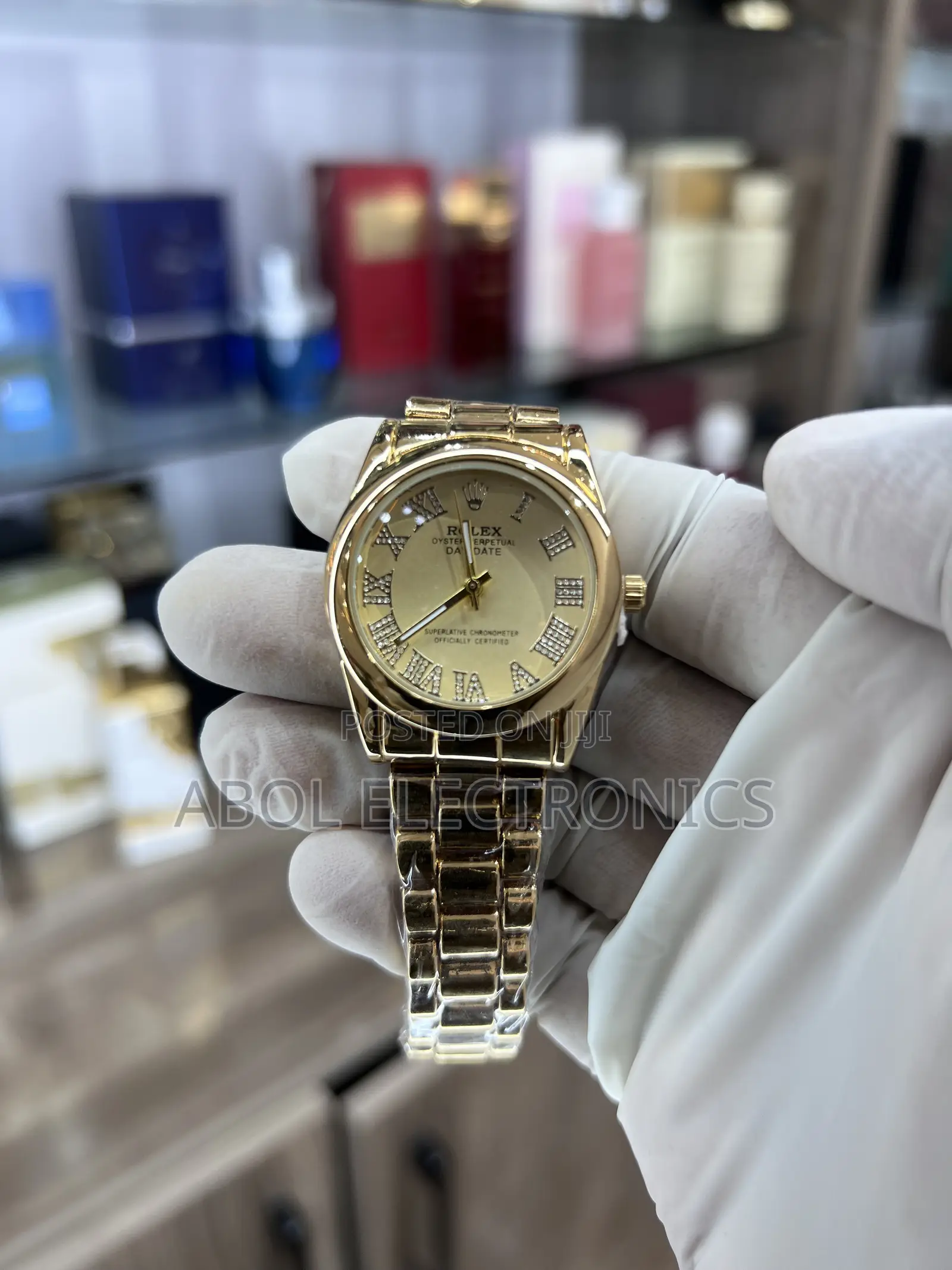Rolex Gold Day-Date - Champagne Dial With Diamond Roman Numerals
