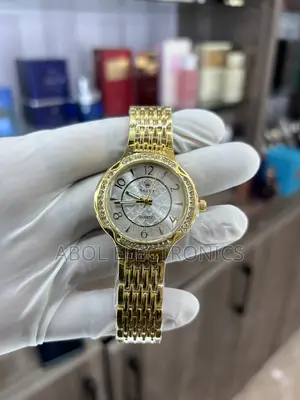 Rolex Gold Women's Quartz Watch - Silver Patterned Dial Diamond