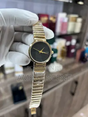 Calvin Klein Gold Women's Quartz Watch - Black Striped Dial Segment