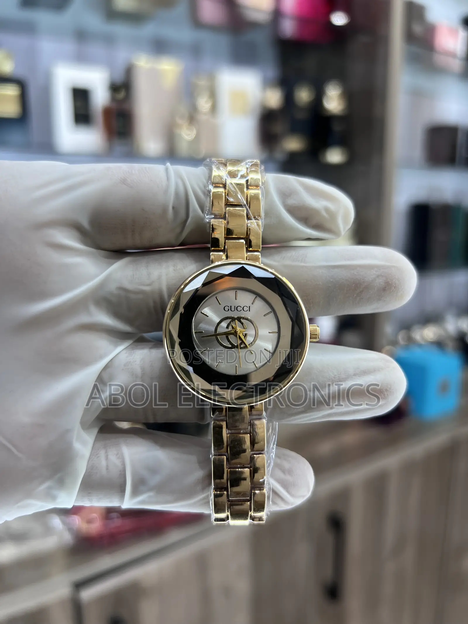 Gucci Gold Women's Quartz Watch - Faceted Glass Silver Monogram Dial