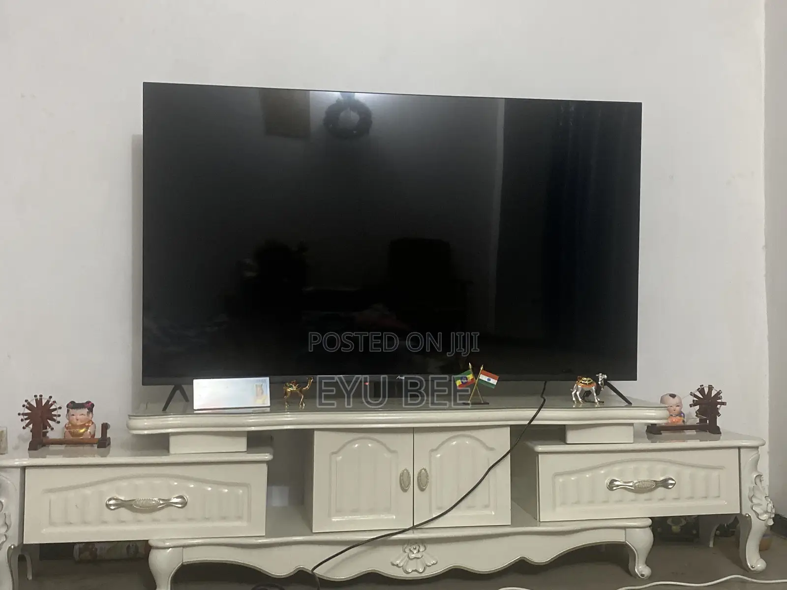 65 Inch Brand New TV With Its TV Stand
