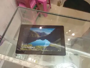 Photo - New Dell Latitude 7202 64 GB Black