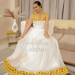 Elegant White Yellow Habesha Kemis