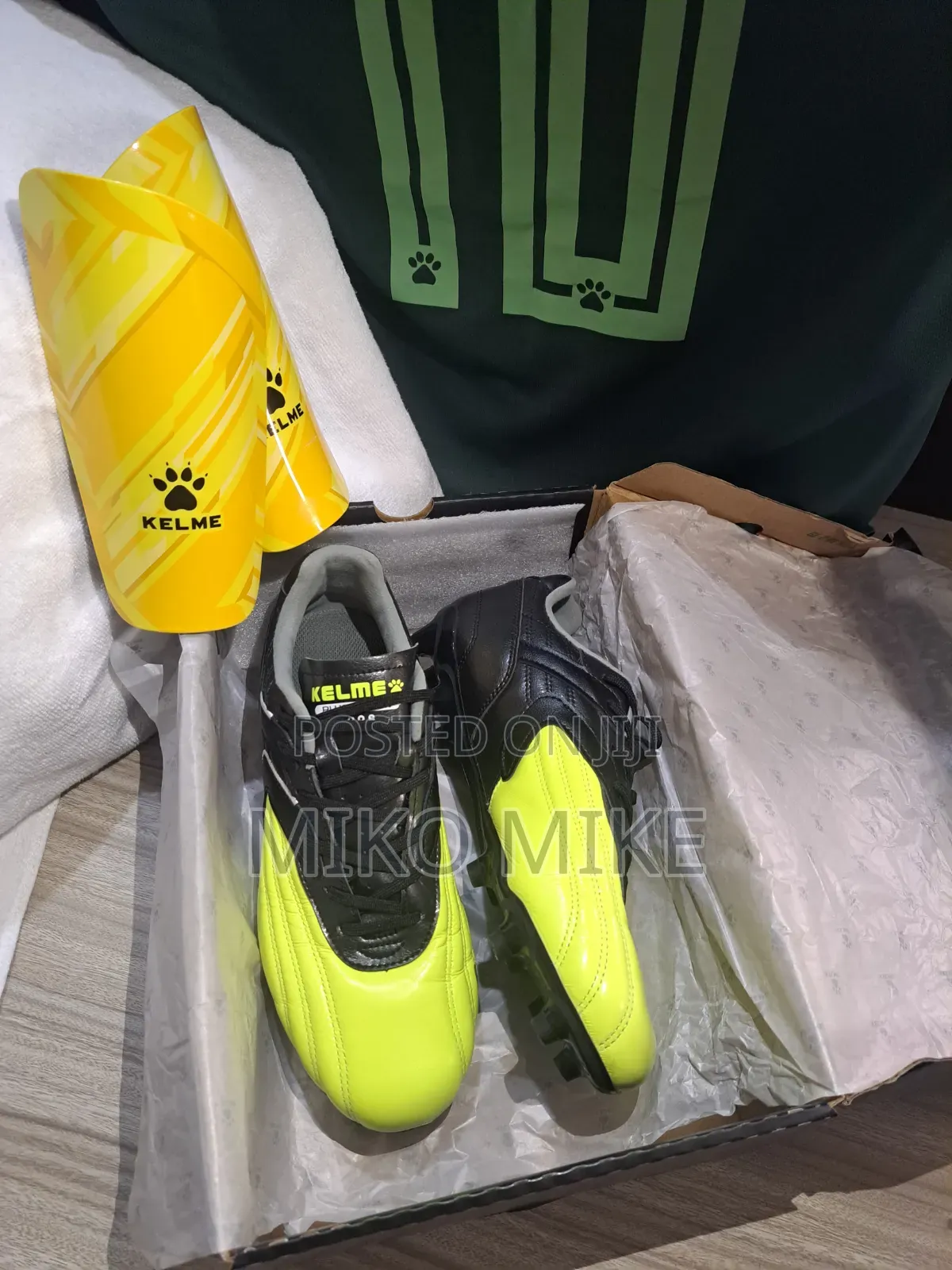 KELME Football Cleats + Shin Guards