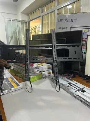 TV Wall Mount ተቪ መስቀያ