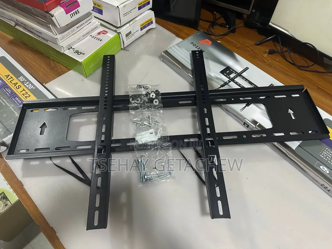 TV Wall Mount ተቪ መስቀያ