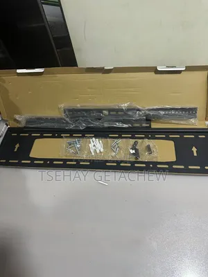 TV Wall Mount ተቪ መስቀያ