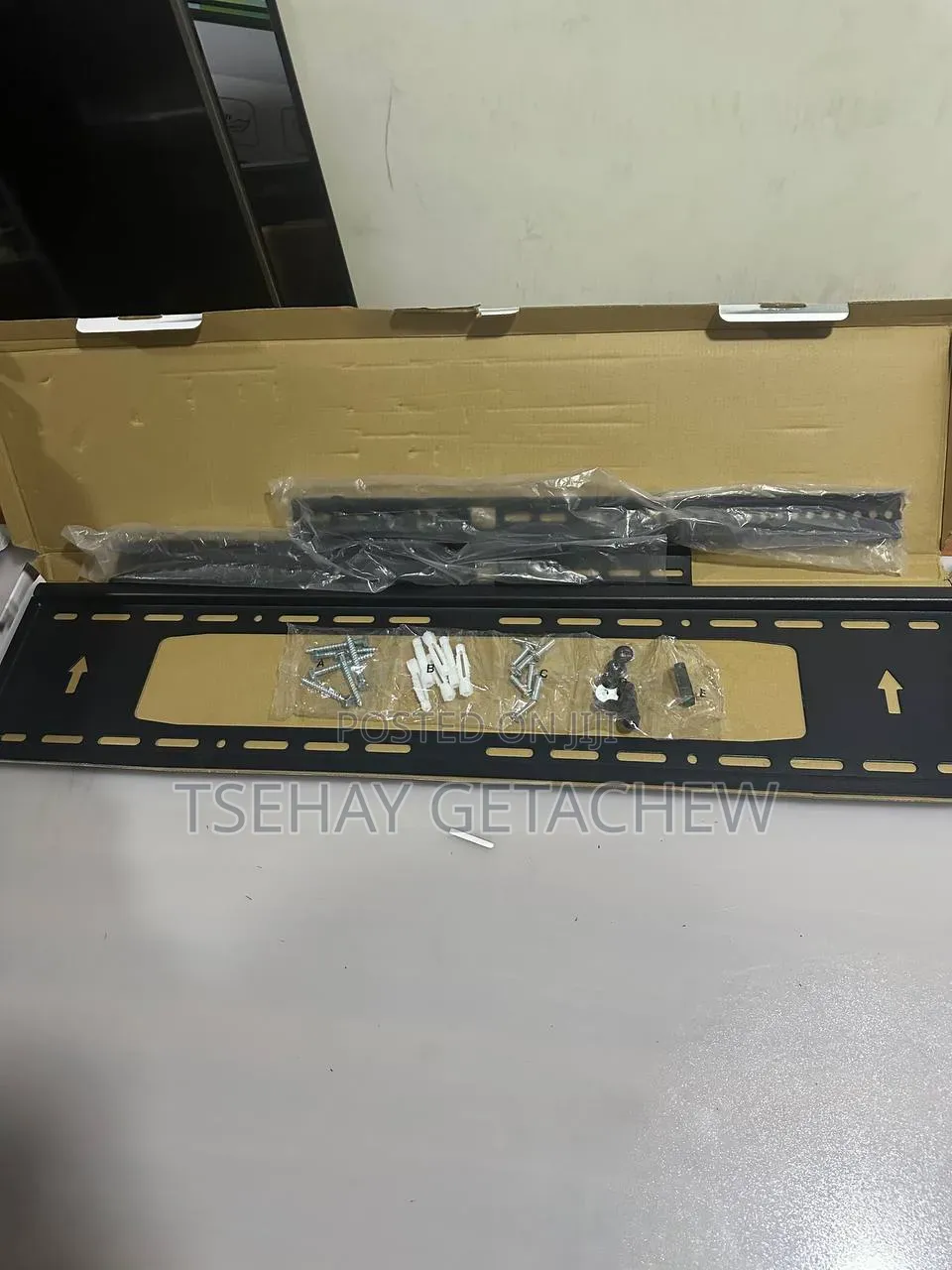 TV Wall Mount ተቪ መስቀያ