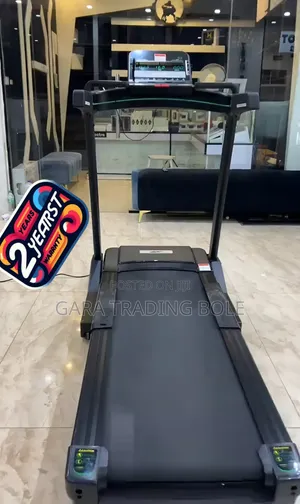 ሞገስ ከትንካሬ ጋር መሮጫ ማሽን