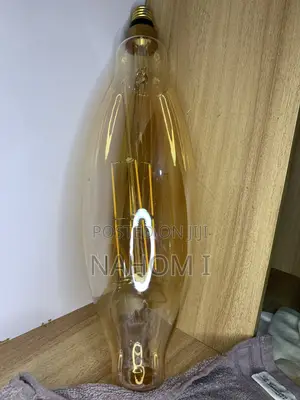 LED Amber Filament (Energy-Saving, Long Life, Warm Golden Glow).