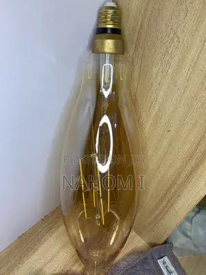 LED Amber Filament (Energy-Saving, Long Life, Warm Golden Glow).