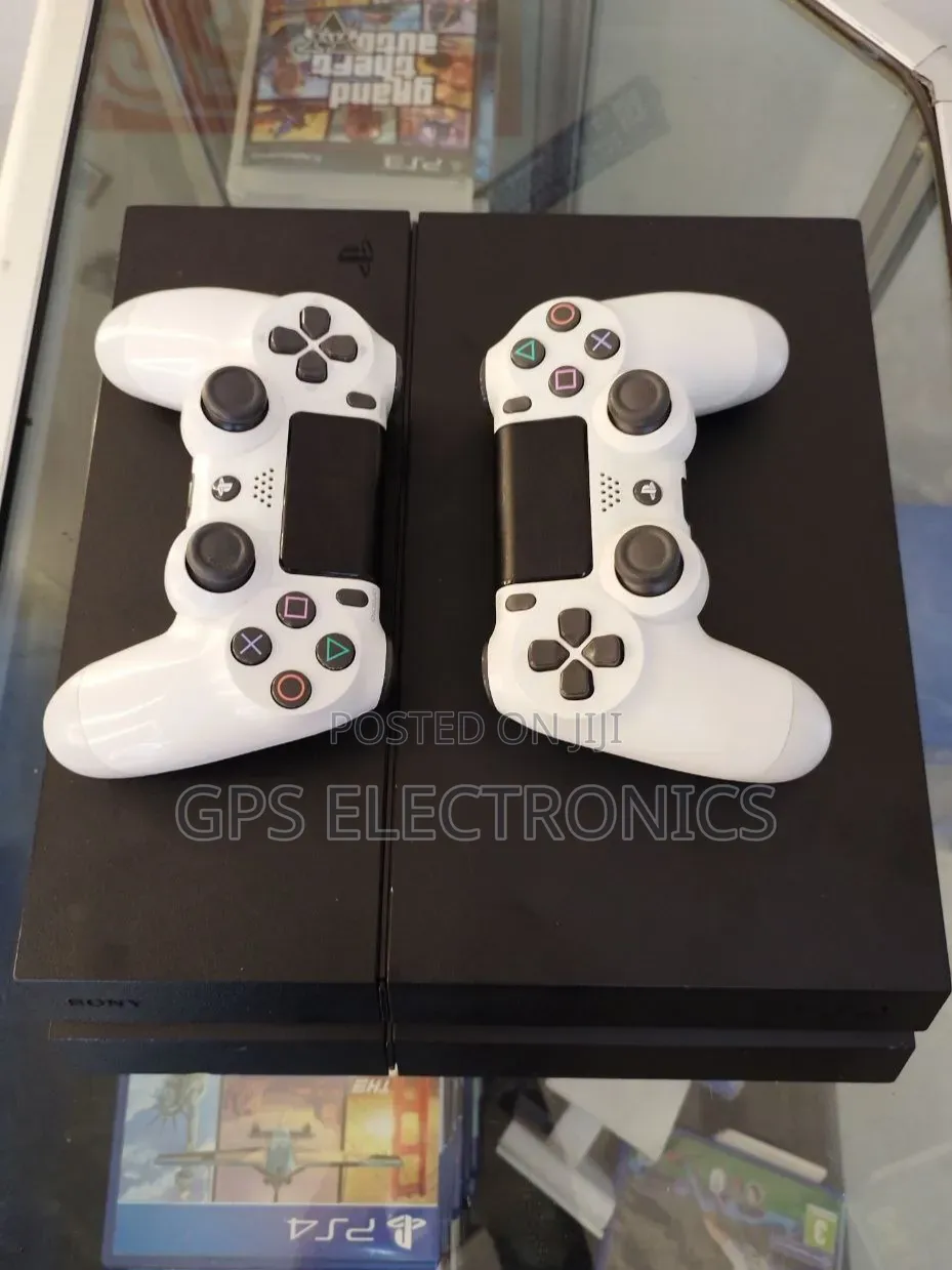 PS4 FAT ከ2 Original Controller ጋር – ዝግጁ ለመጫወት