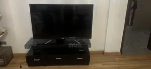 JVC 55 Inch Used TV and TV Stand