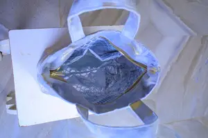 ዘመናዊ ግራጫና ወርቃማ የእጅ ቦርሳ