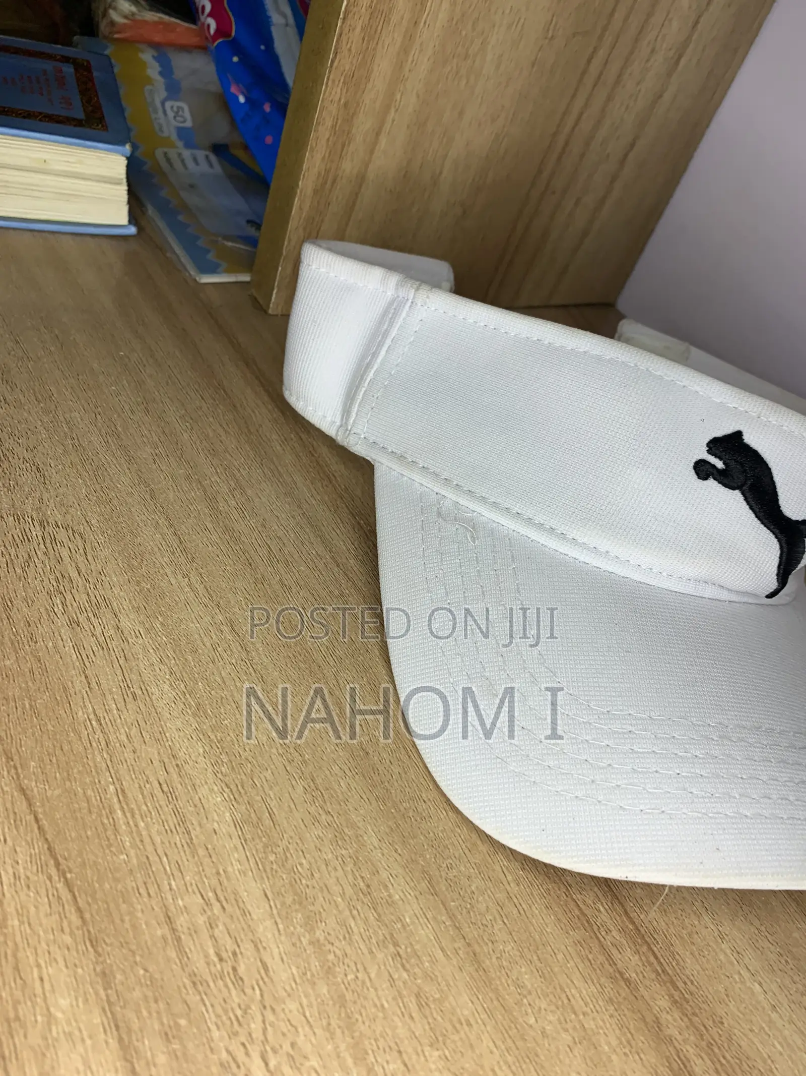 Black Jumping Cat Logo on the Front.