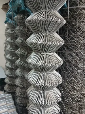 ,Appears to Be a Roll of Galvanized Steel Chain-Link Fencing.