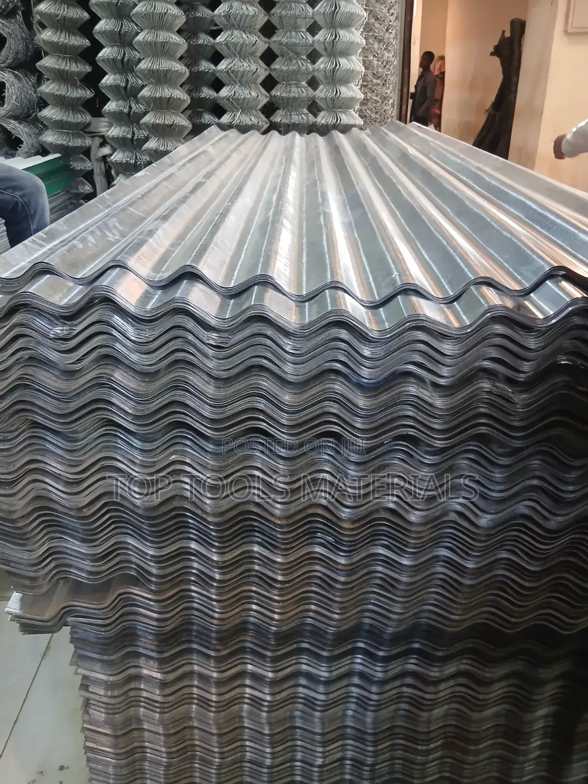 Corrugated) ጋልቫናይዝድ ብረት ሳህኖች በግንባታ ላይ በተለምዶ ለጣሪያ እና ለግድግዳ መሸፈኛ የሚያገለግሉ