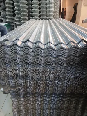 Corrugated) ጋልቫናይዝድ ብረት ሳህኖች በግንባታ ላይ በተለምዶ ለጣሪያ እና ለግድግዳ መሸፈኛ የሚያገለግሉ