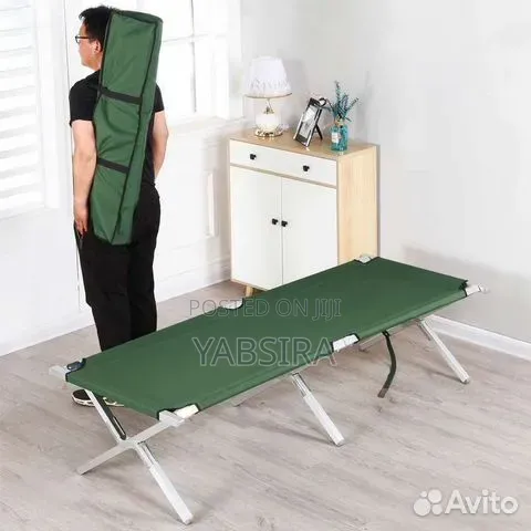 ገብቷል Folding Travel Bed