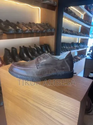 ንፁ ቆዳ ጫማ, Pure Leather Shoe