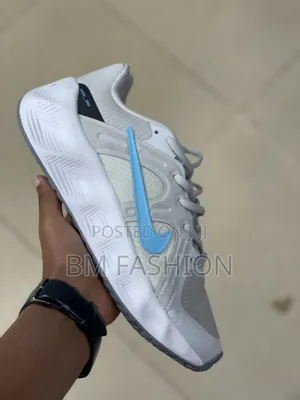 Nike Motiva Light Grey Sneakers