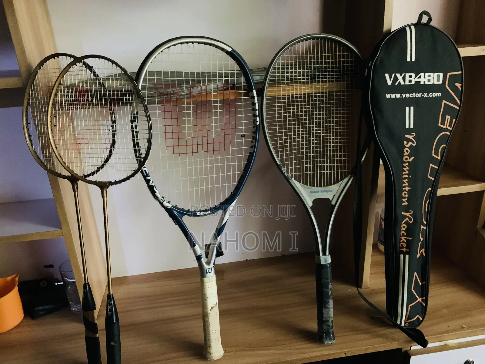 Stringed Sport Racquets—two Smaller Golden