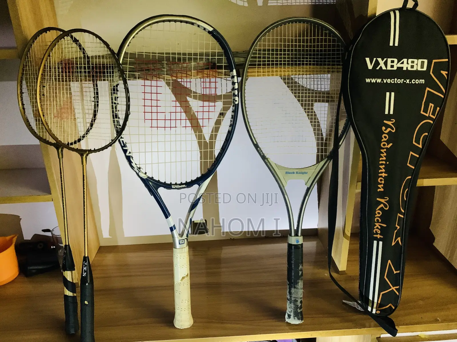 Stringed Sport Racquets—two Smaller Golden