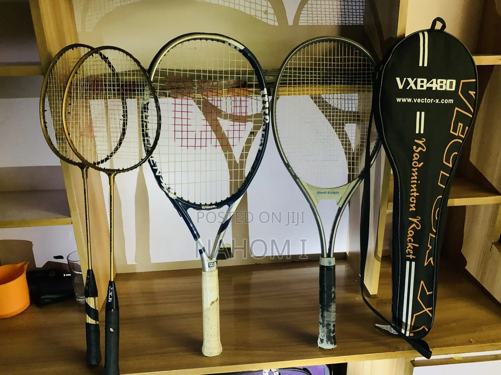 Stringed Sport Racquets—two Smaller Golden
