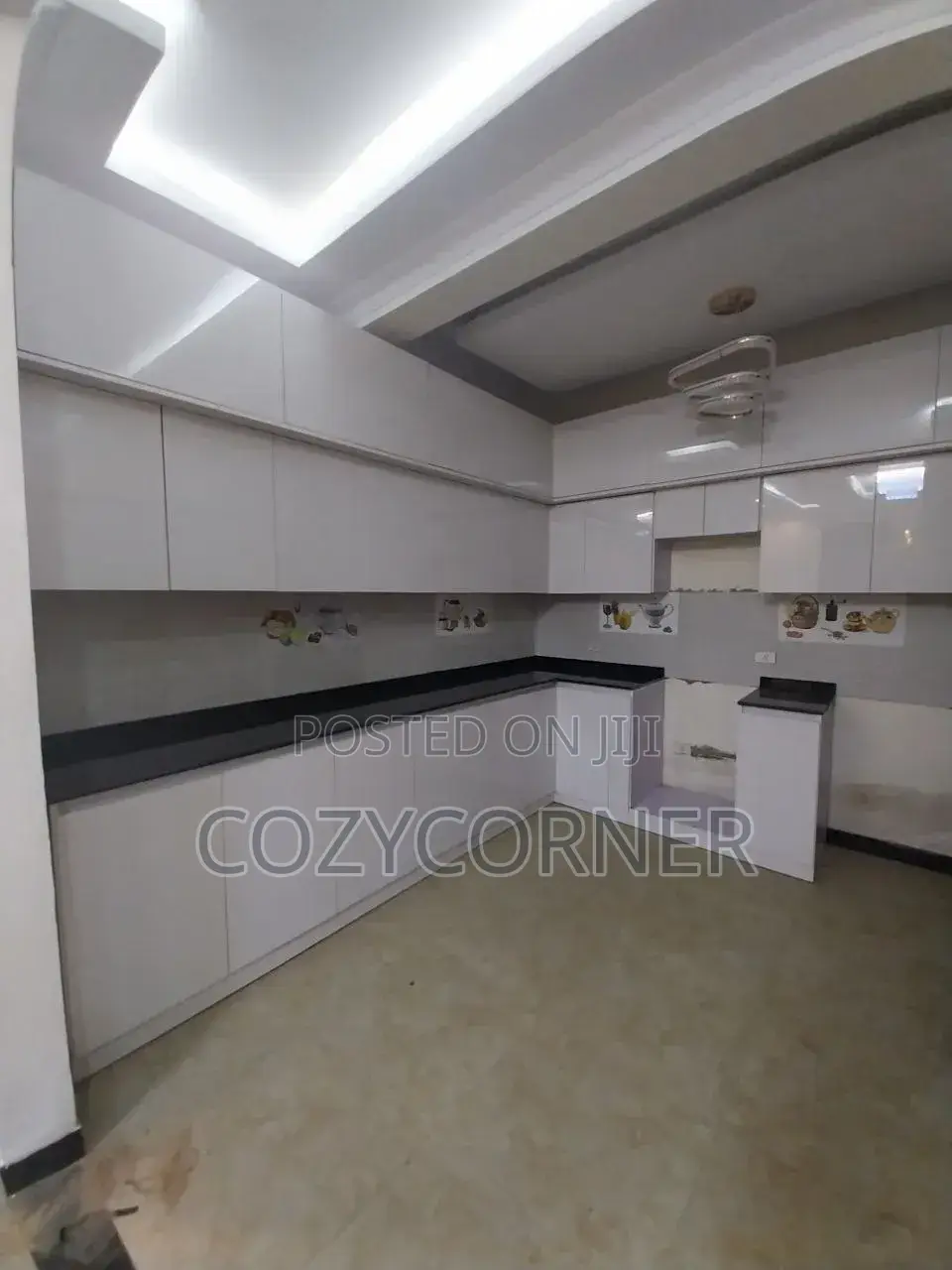 Flossy Kitchen Cabinet Priced Per Meter Square. ኪችን በካሬ