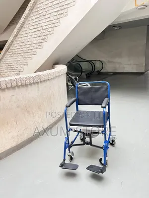 14. Manual Wheelchair With Footrests
    ከእግር ማሳረፊያ ጋር የሚመጣ ዊልቸር