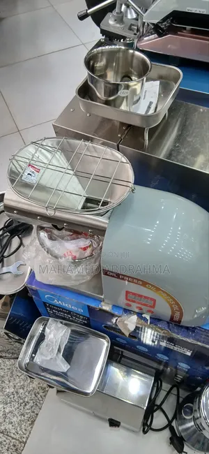 በሠአት 12ሊትር የሚጨምቅ የዘይት ማሽን
