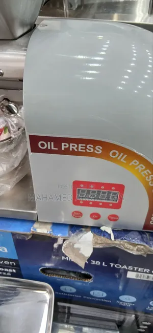 በሠአት 12ሊትር የሚጨምቅ የዘይት ማሽን