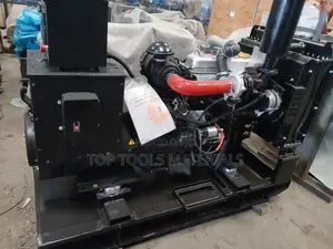 ,Industrial Diesel Generator Set Mounted on a Black Steel Skid Frame.